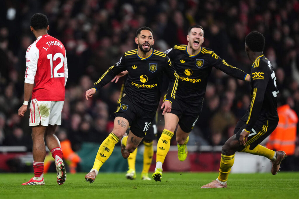 kulitbandar.id, - pemain manchester united matheus cunha merayakan gol kemenangan mu atas arsenal